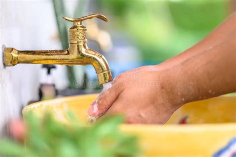 Washing Hands At Brass Faucet Stock Photo Image Of Retro Design