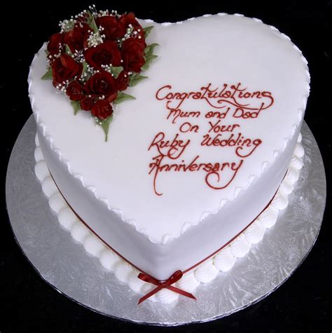 Anniversary cake delivery anniversary cake delivery in delhi ncr. heart shaped ruby wedding cake (I do not like the piping ...