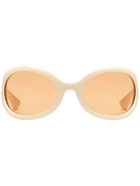 gucci oval frame tinted sunglasses editorialist