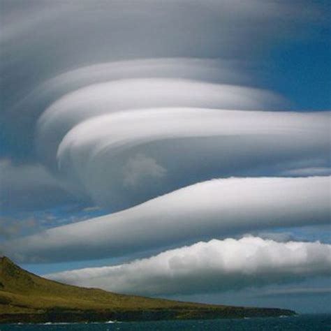 Lenticular Clouds Are Stationary Lens Shaped Clouds That Form In The Troposphere Normally In