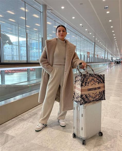 10 Winter Travel Outfits To Keep You Cozy And Chic The Cool Hour