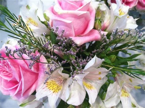 Light Pink Roses And White Alstroemeria Make Up Our Bouquets For A 400