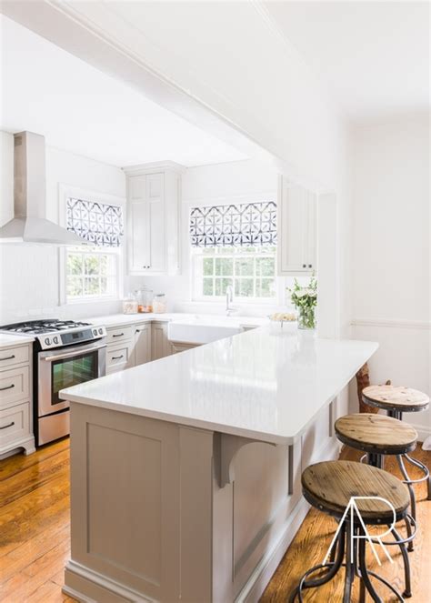 Brown/gray wire brush wood counter height swivel stool. Gray Kitchen Peninsula with Wood and Metal Swivel Stools