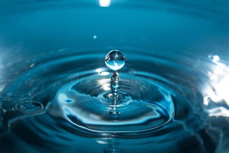 Splash Of Water Close Up Water Drop A Blue Drop Of Water Falling