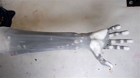 man developed artificial muscles robotic arm with full range of motion shouts