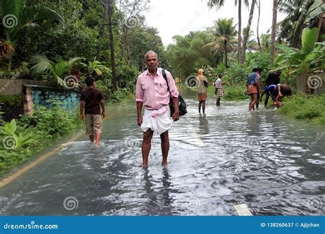 People Walk Through The Flooded Roads Editorial Photography Image Of