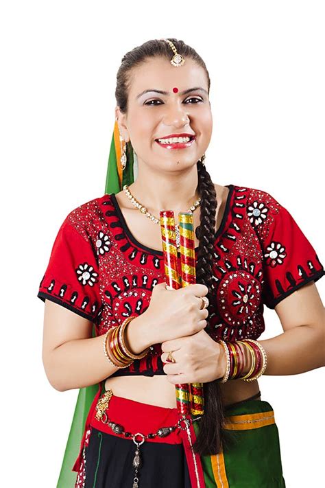 Traditional Indian Gujrati Woman Holding Dandia Sticks On Navratri Festival Garba Dance