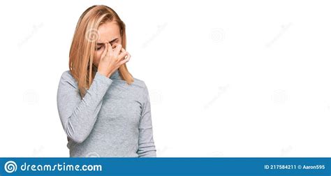Beautiful Caucasian Woman Wearing Casual Clothes Tired Rubbing Nose And Eyes Feeling Fatigue And