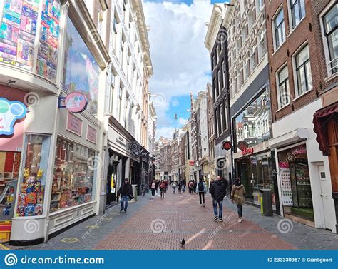 People Walking In The Kalverstraat Street Amsterdam The Netherlands