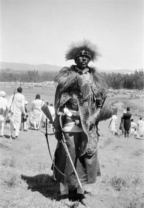 An Abyssinian Ethiopian Warrior Carrying A Rifle And Shield And