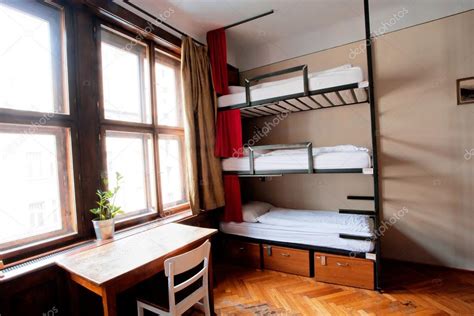 Three Level Dormitory Beds Inside The Hostel Room For Six Tourists Or