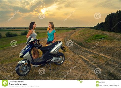 Teenage Girls Resting After Riding Motorcycle Stock Image Image Of
