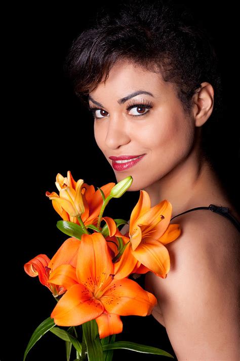 Woman With Lily Flowers Photograph By Artur Bogacki
