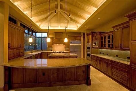 Fantastic Cabinetry And Vaulted Ceilings In This Kitchen Uplighting