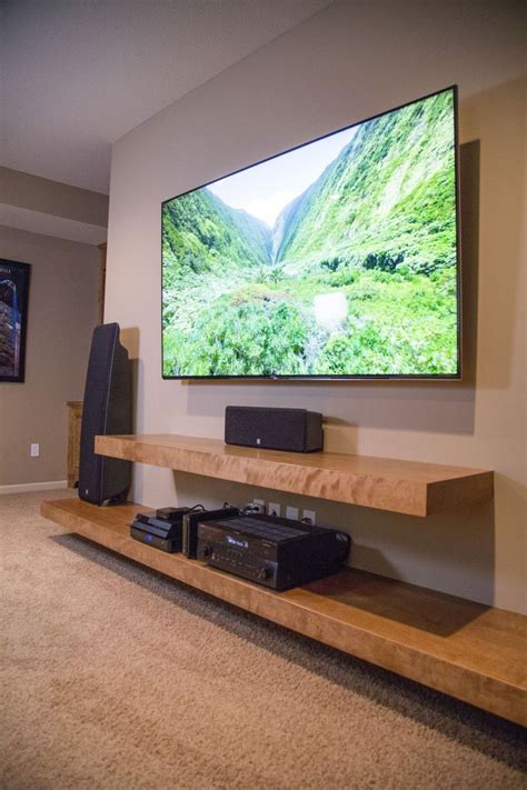 Does the job i installed over a tv to hold all components such as apple tv, cable. 52 Wall TV Placement Ideas by Using Pallets Material ...