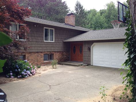 Siding: Mastic Cedar Discovery 9.5" Hand-split shakes in Weathered