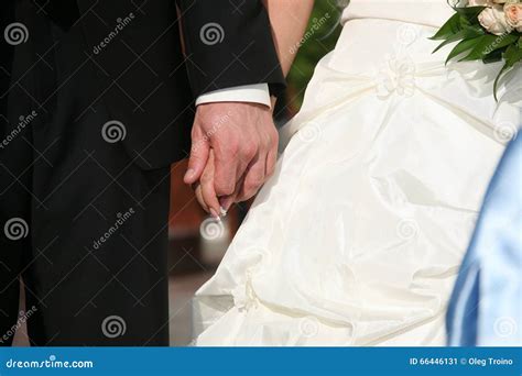Groom Holds The Bride By The Hand Closeup Stock Image Image Of