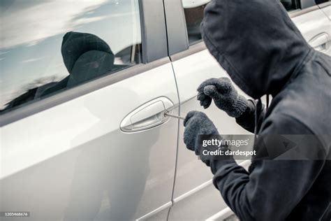 Man Stealing A Car High Res Stock Photo Getty Images
