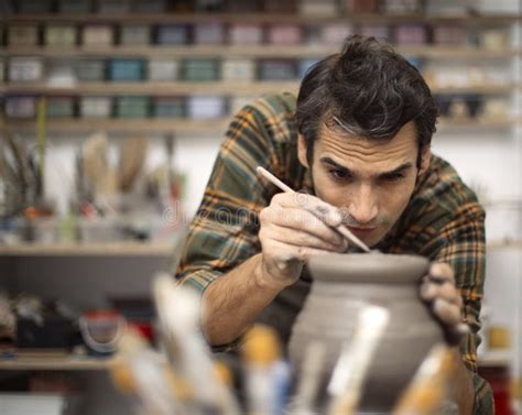 Young Man Making Pottery In Workshop Stock Image Image Of Finger
