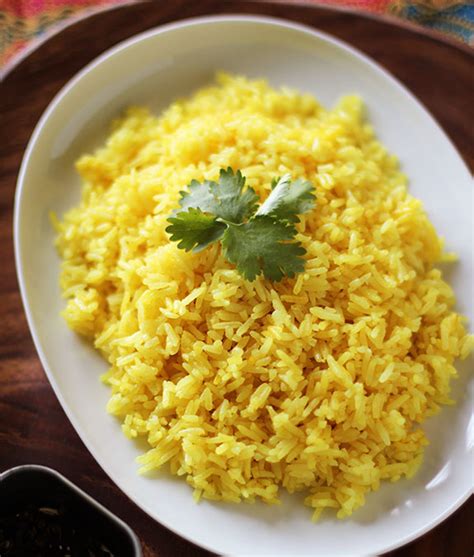 In south africa, geelrys is a type of yellow rice made with basmati rice, sugar and topped with raisins (1), whereas in peru, juane rice is seasoned with turmeric, oregano and cumin, and served topped with boiled eggs and olives (2). Eat Your Greens » Fragrant Yellow Rice