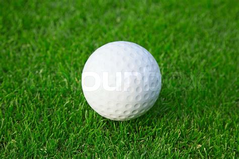 Golf Ball On The Green Grass Of The Golf Course Stock Image Colourbox