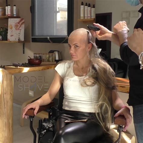 Woman With Long Blond Hair Shaves Her Head Bald At The Hair Salon