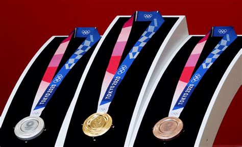 The gracenote virtual medal table. PICS: 2020 Olympic medals made from recycled metals ...