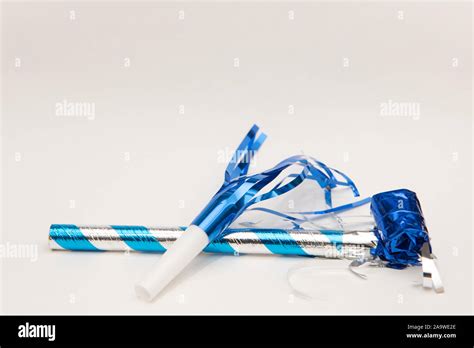 Isolated Blue Party Blowers On White Background Stock Photo Alamy