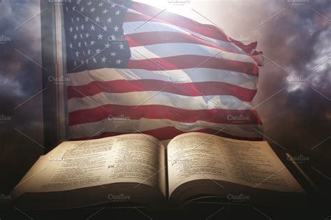Holy Bible With The American Flag High Quality Stock Photos