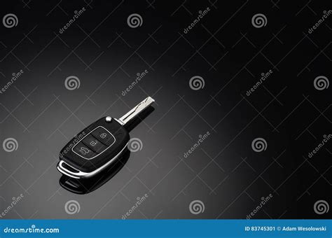 Modern Car Keys Isolated On Black Reflective Background Stock Image
