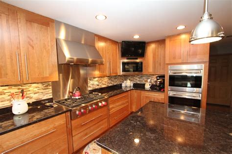 Natural Cherry Cabinets With Granite Countertops An Oversized Island Black Granite