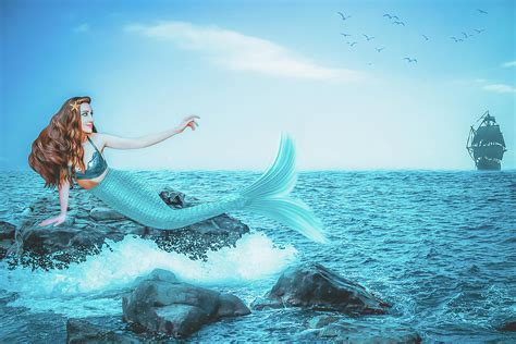 Beautiful Mermaid On The Stone In The Blue Sea Closeup Art Processing