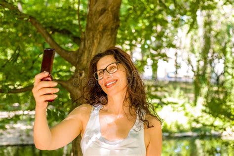 Mature Woman Is Taking A Selfie Stock Photo Image Of Selfie