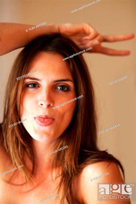 Closeup Portrait Of Funny Young Woman Jerking Making Funny Face