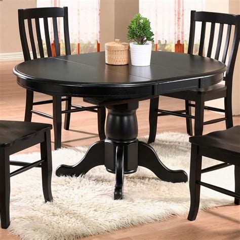 Related articles to nebraska furniture mart coffee tables Quails Run 57" Pedestal Table in Ebony with 15" Leaf ...
