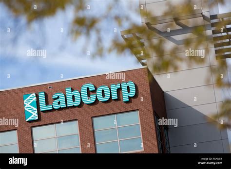A Logo Sign Outside Of The Headquarters Of Laboratory Corporation Of