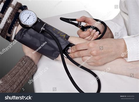 Doctor Measures Blood Pressure Patient Stock Photo 544923259 Shutterstock