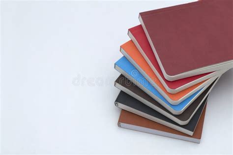 Stack Of A Colorful Diary Planers Isolated On A White Background Stock