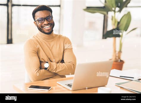 Portrait Of Confident African Guy Looking At Camera Stock Photo Alamy