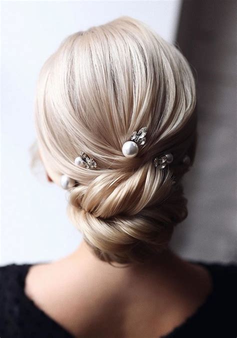 20 trendy low bun wedding updos and hairstyles 2023