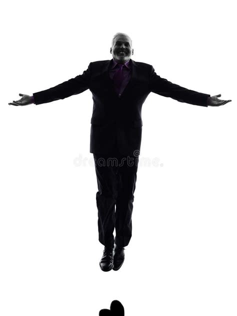 Senior Business Man Jumping Arms Outstretched Silhouette Royalty Free