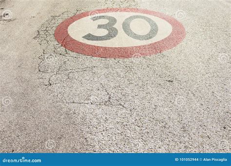 30kmh Speed Limit Sign Painted On Asphalting Road Stock Photography