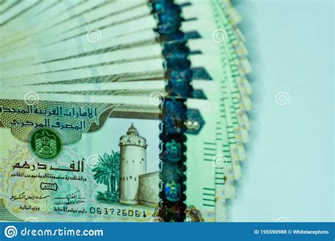 Close Up United Arab Emirates Currency Dirhams And Fils Dubai Abu