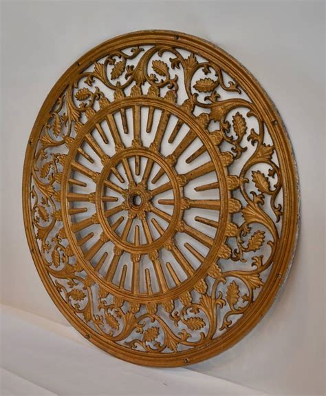 Iron, bronze and brown nickel chandeliers. Monumental Cast Iron Ceiling Medallion at 1stdibs
