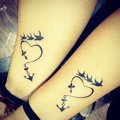 In most cases, both the man and the woman get the. Couple tattoo heart anchor birds did this about two weeks ...