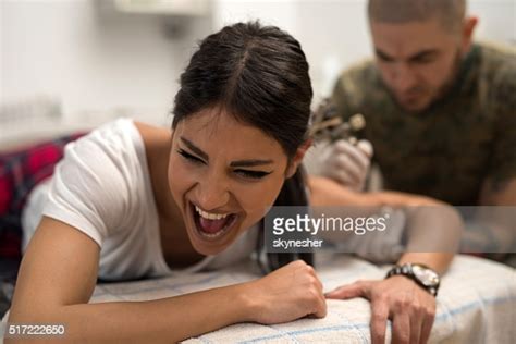 Screaming amateur 21 screaming mature. Young Woman Screaming In Pain While Receiving A Tattoo High-Res Stock Photo - Getty Images