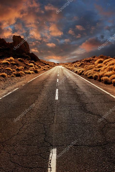 Road Through Sunset Desert — Stock Photo © Anterovium 83908418