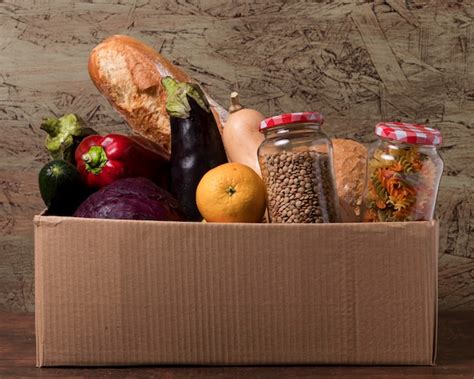 Free Photo Cardboard Box With Vegetables And Fruits