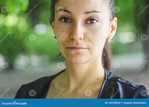 Outdoors Portrait Of A Beautiful Brown Eyed Woman Stock Photo Image