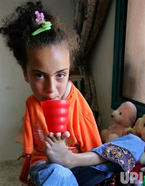 Girl Born Without Arms Manages Her Life With Her Feet In Gaza